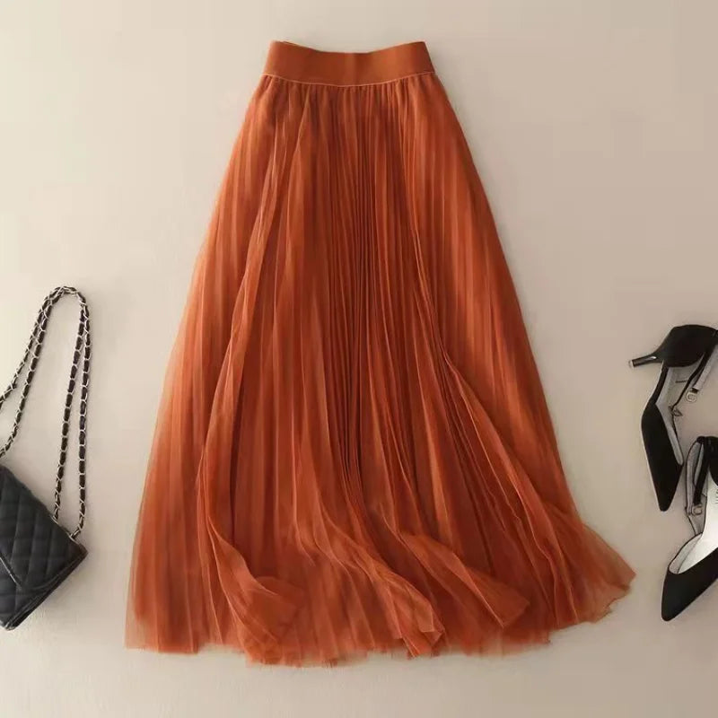 Stylish A-line pleated midi skirt for women, high-waisted design, a staple in modern fashion.