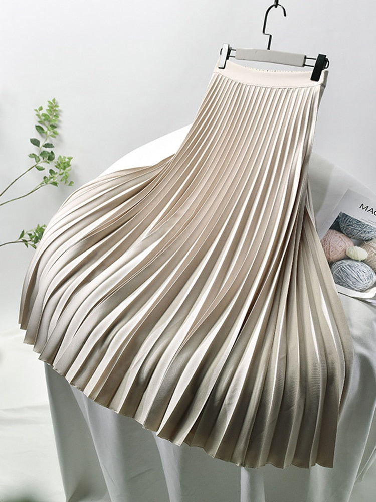 Chic high-waisted midi skirt for women, featuring elegant pleats & a classic, versatile style.