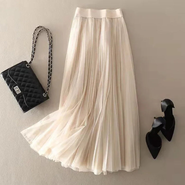 Classic black high-waisted pleated midi skirt for women, an elegant A-line silhouette for all seasons.
