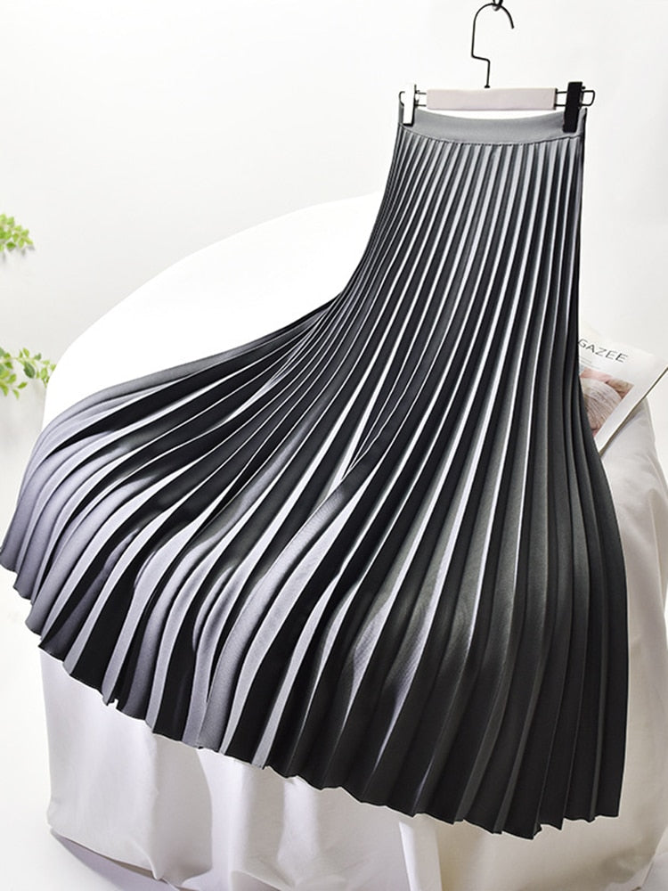 Versatile women's elegant pleated high-waisted midi skirt, suitable for both formal & casual outfits.