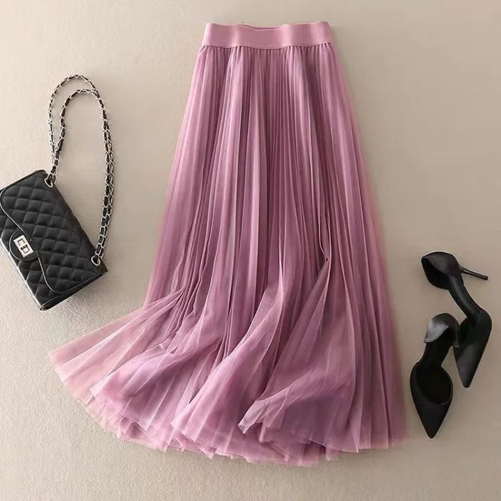 Versatile women's high-waisted pleated midi skirt, ideal for creating chic and sophisticated outfits.