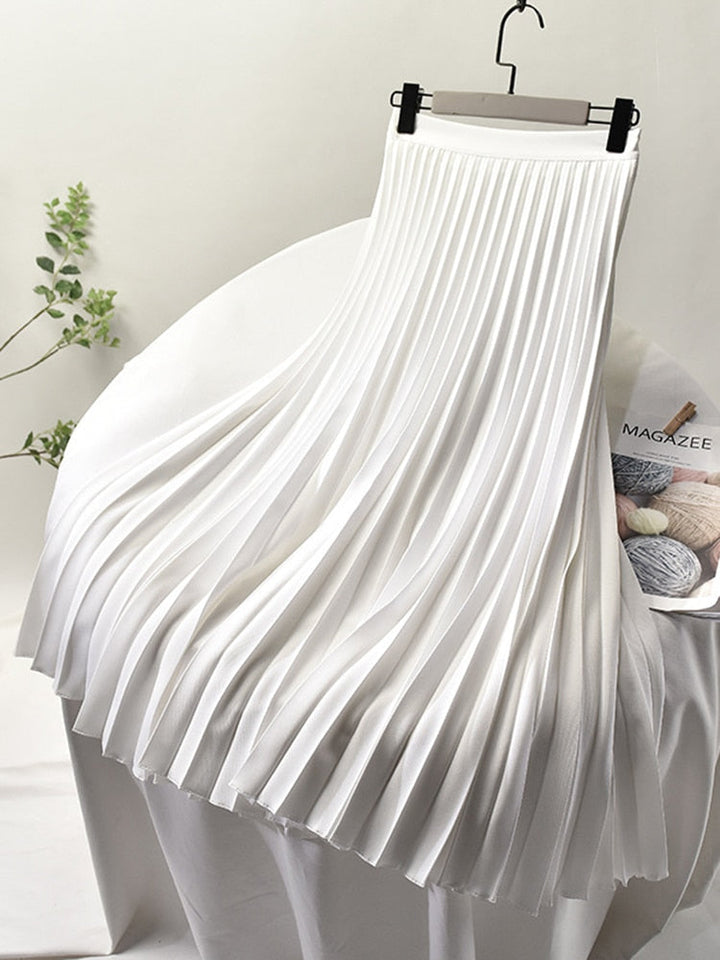 Classic women's high-waisted pleated midi skirt, an elegant statement piece for modern fashion.