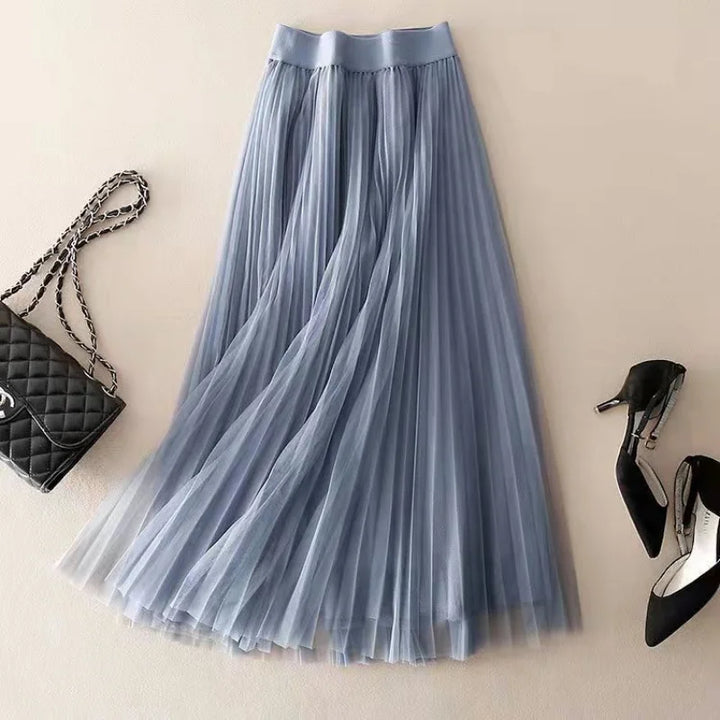 Front view of a women's high-waisted pleated midi skirt, highlighting its elegant structure.
