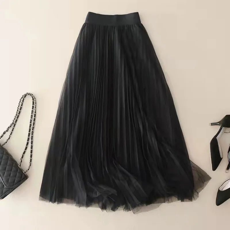 Fashionable women's high-waisted pleated midi skirt, offering both comfort and a polished look.