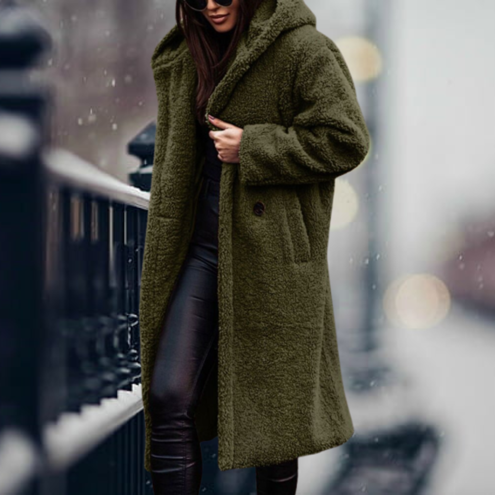 Cozy hooded winter jacket for women, offering elegant warmth & stylish cold weather outerwear fashion.