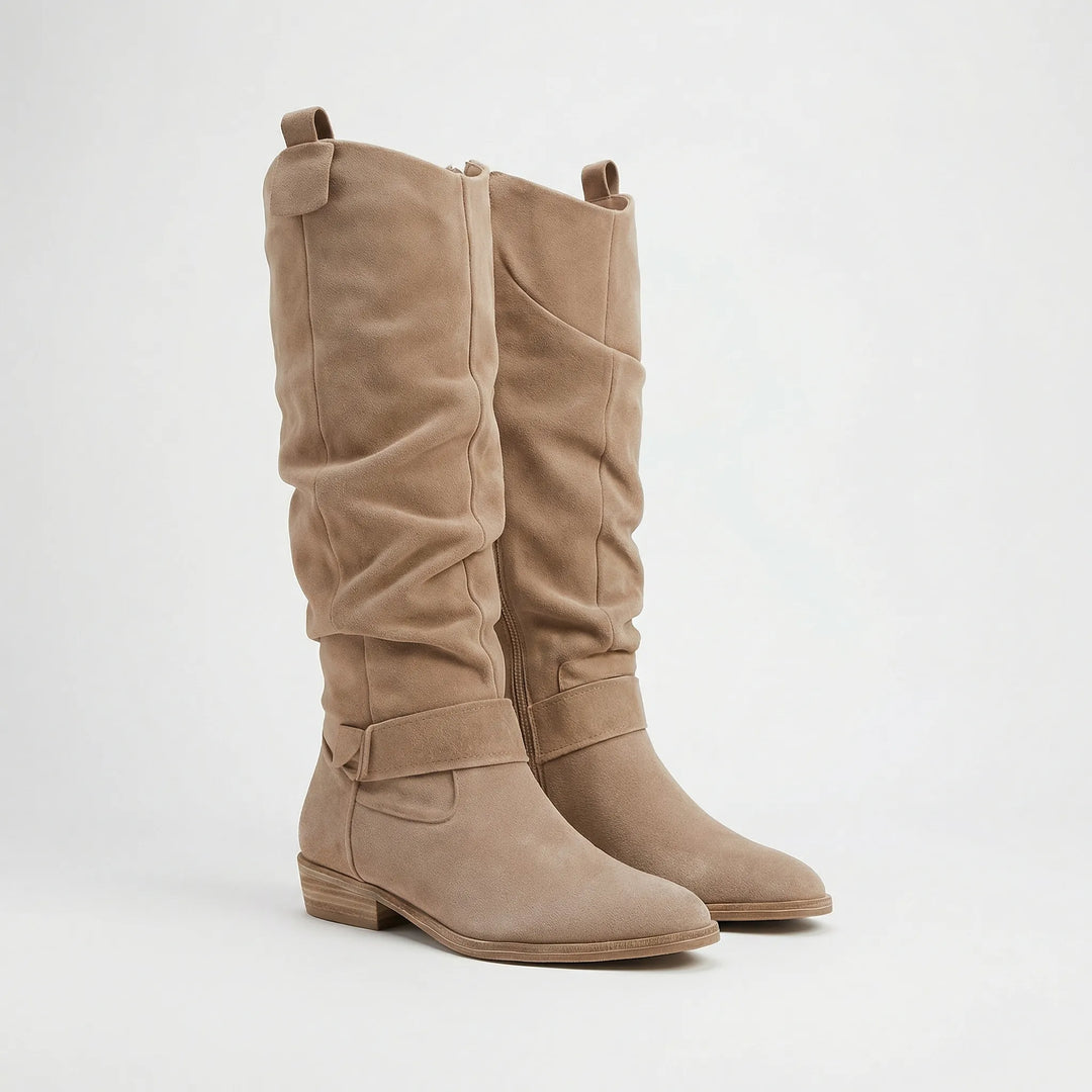 Comfortable & elegant women's knee-high boots with low heel. Perfect stylish footwear for autumn & winter.