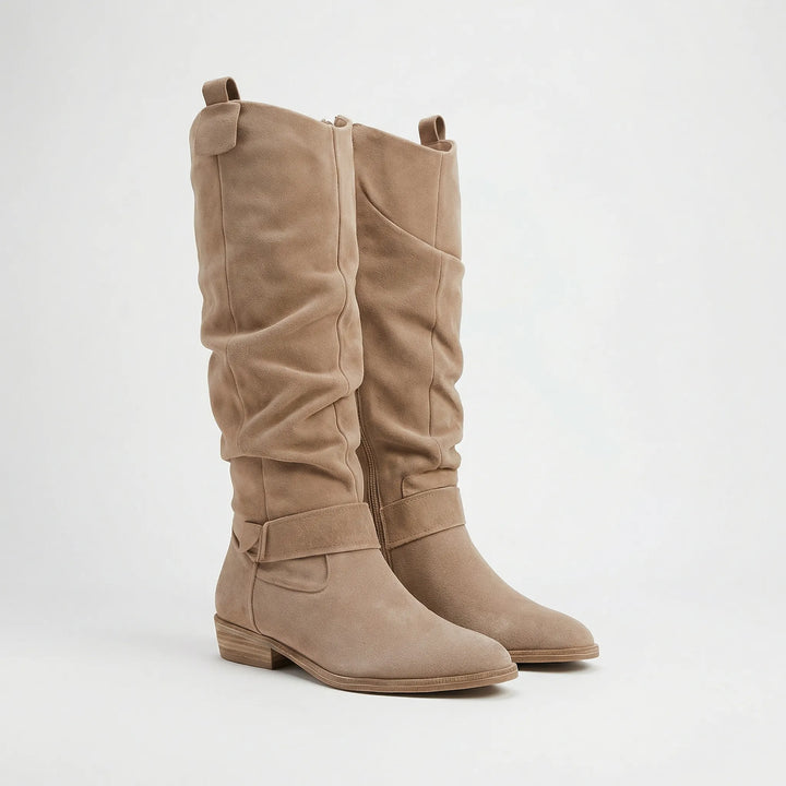 Comfortable & elegant women's knee-high boots with low heel. Perfect stylish footwear for autumn & winter.