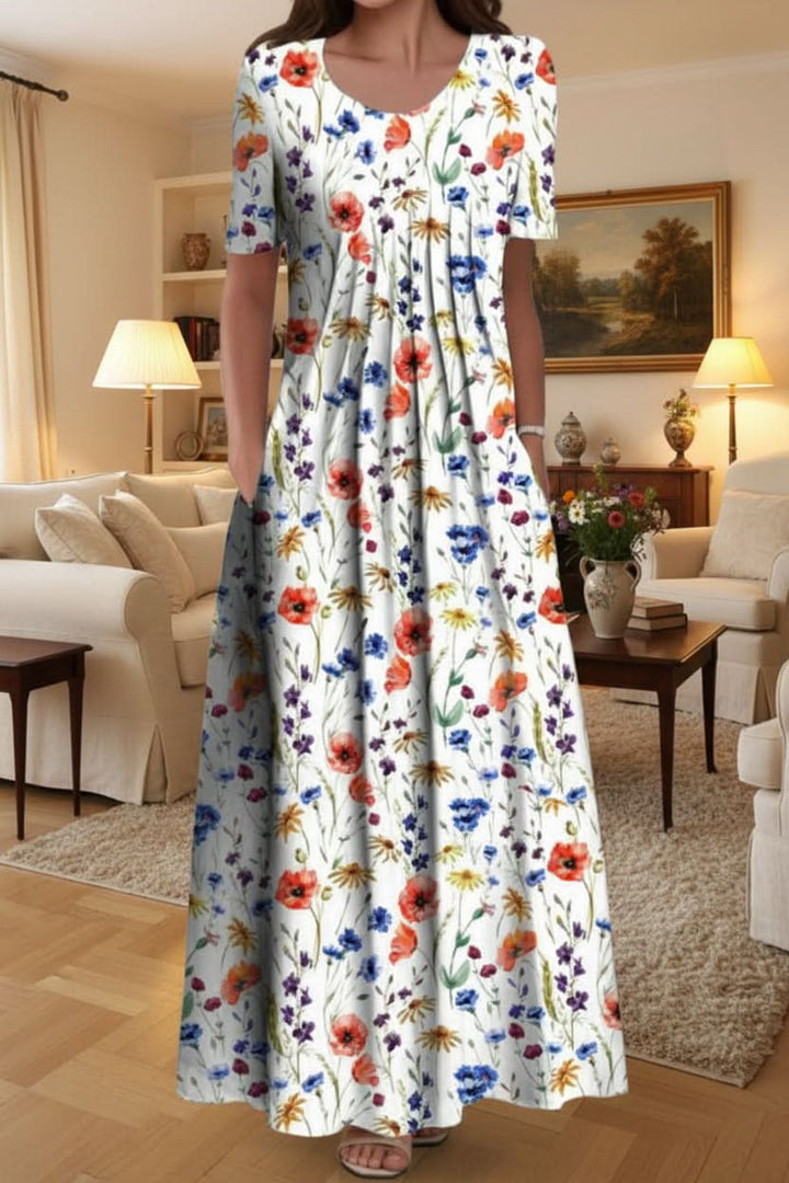 Must-have women's floral knee-length dress with pockets, combining elegance with everyday functionality.