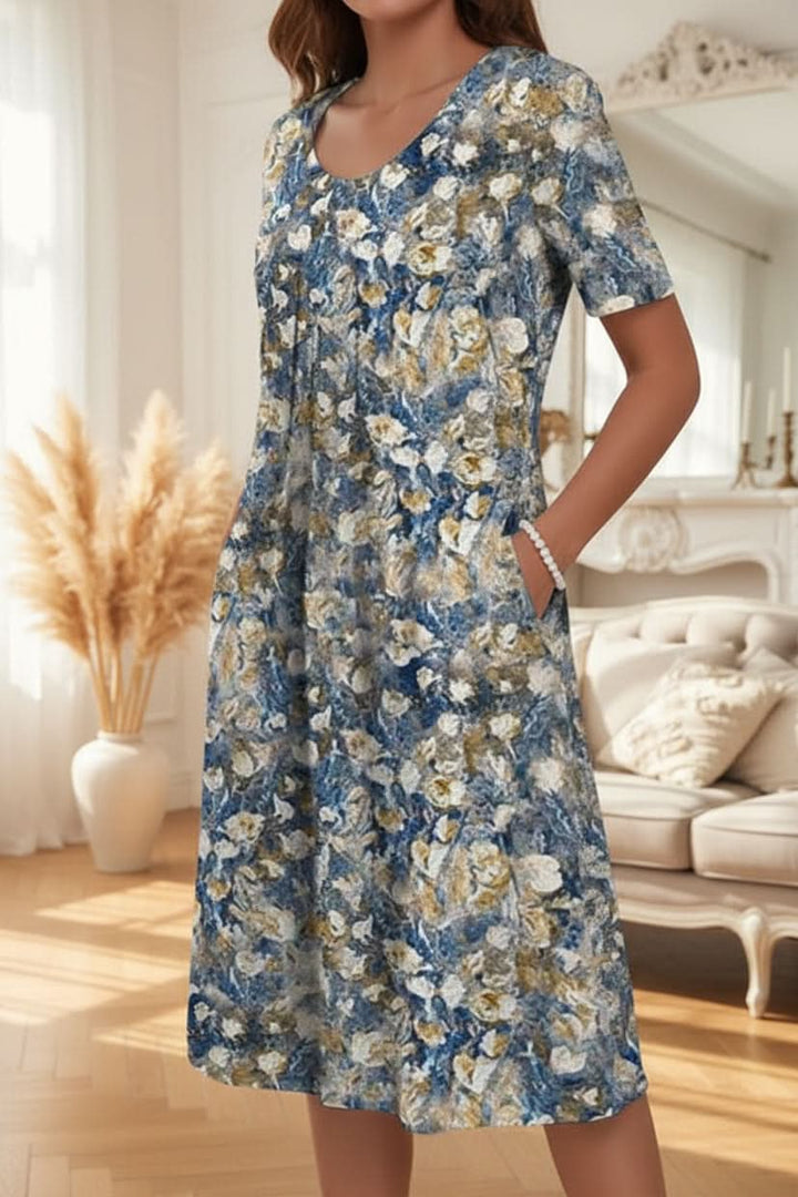 Women's elegant knee-length floral dress with pockets, a perfect summer or day dress for versatile wear.