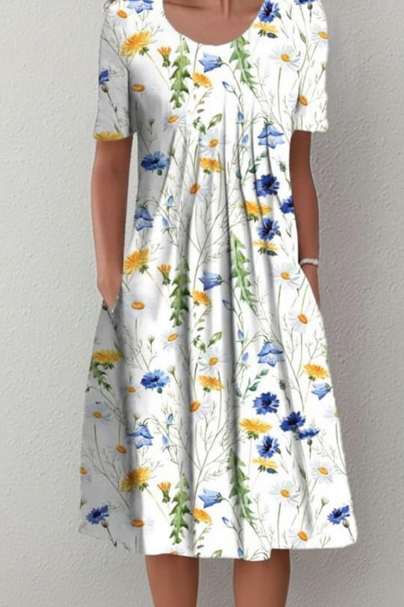 Elegant yet casual women's floral knee-length summer dress with convenient pockets for everyday style.
