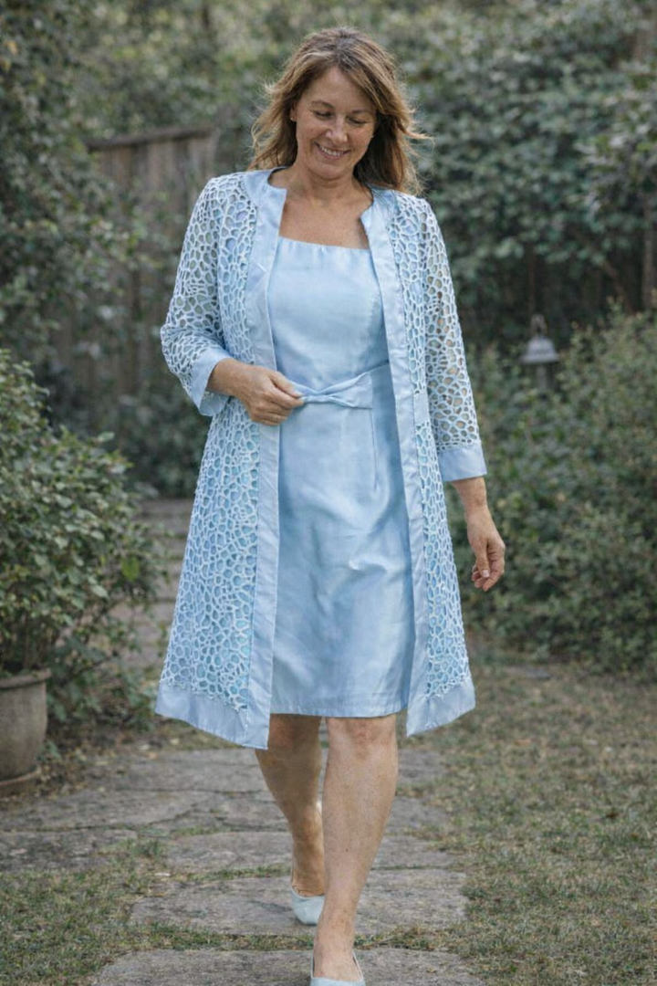 Women's party dress and jacket set, featuring delicate lace for a sophisticated look.