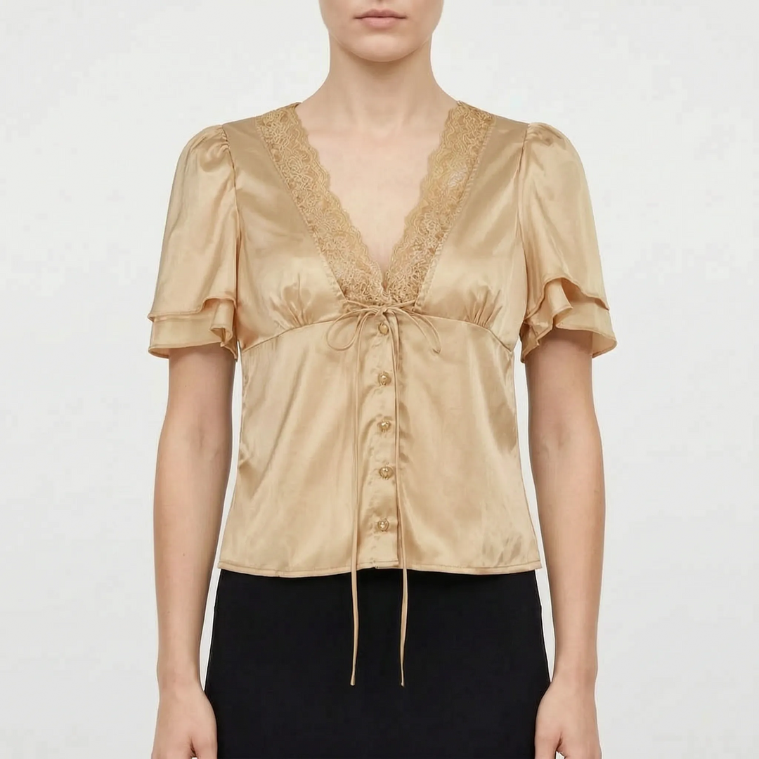 Elegant women's V-neck blouse featuring delicate lace trim, short flutter sleeves, and a casual chic design.
