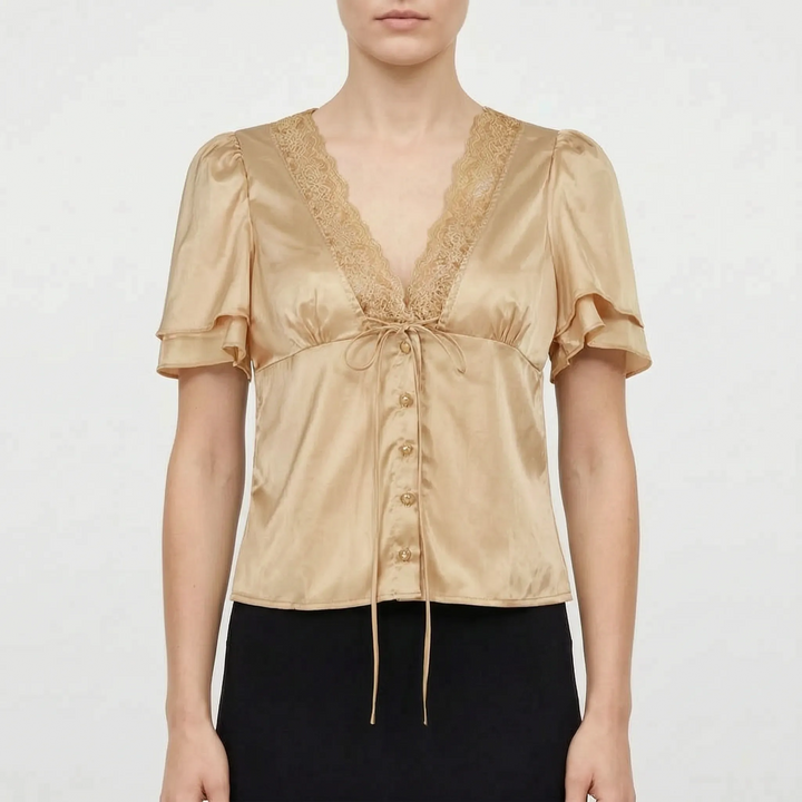 Elegant women's V-neck blouse featuring delicate lace trim, short flutter sleeves, and a casual chic design.