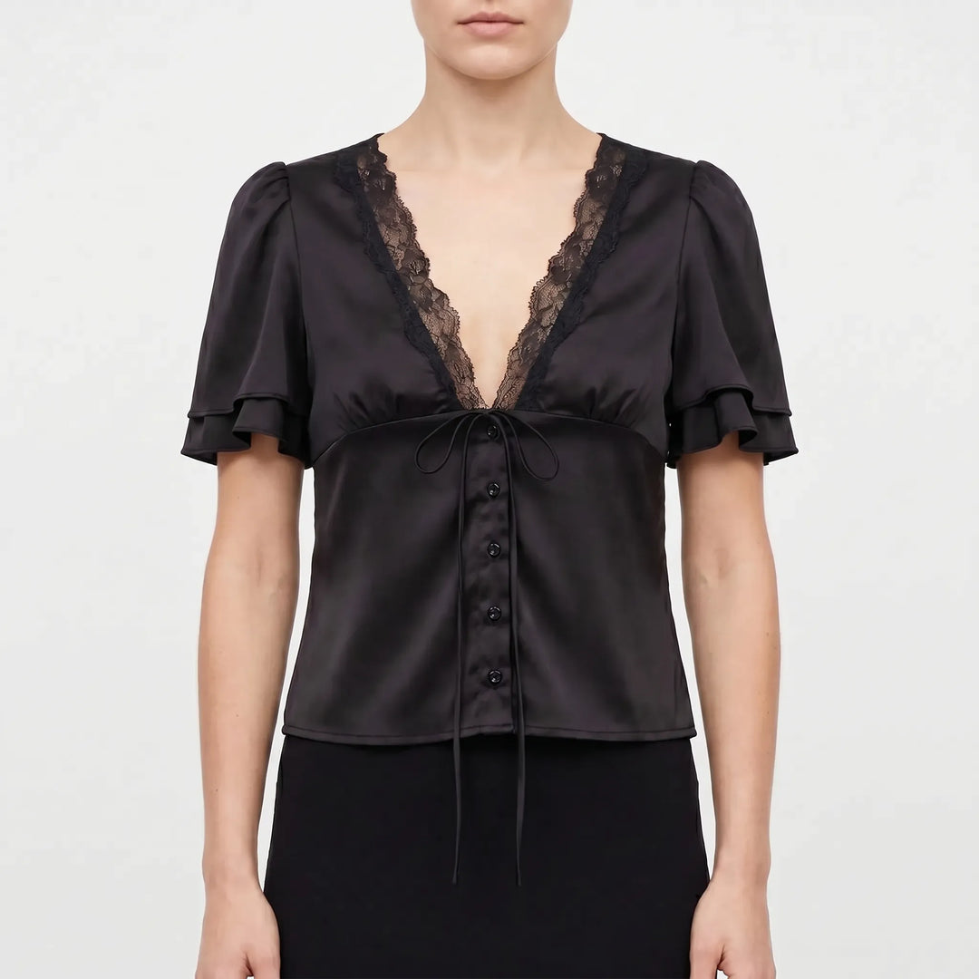 Fashionable women's short-sleeve V-neck blouse with lace trim detail, a versatile elegant top for any occasion.