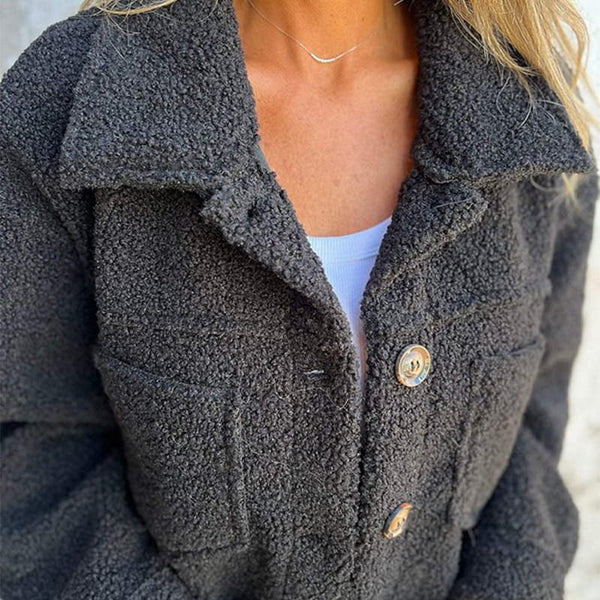 Fashionable women's lapel jacket, a must-have for fall fashion. Elegant, short, and versatile outerwear.
