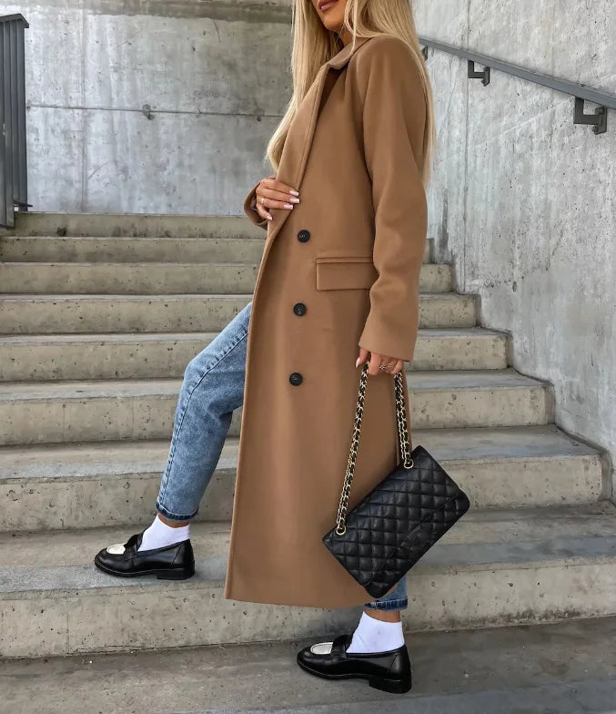 Chic women's long trench coat with a structured, tailored fit. Ideal elegant outerwear for fall & winter.