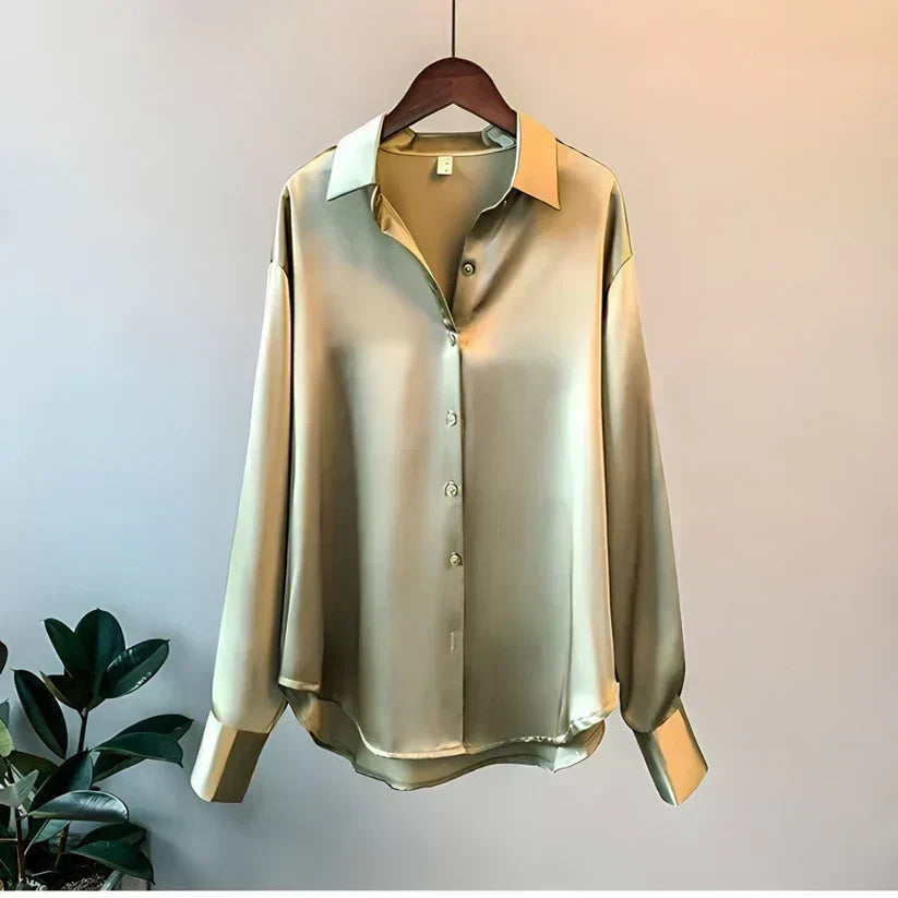 Stylish women's button-down long sleeve blouse in a soft fabric, ideal for versatile fashion.