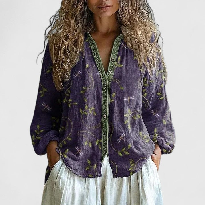 Elegant women's long sleeve blouse with chic leaf print, perfect for versatile casual wear or autumn office attire.