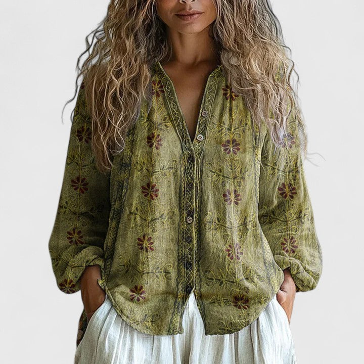 Effortless chic women's long sleeve top with a stylish leaf print, a versatile and comfortable choice for autumn fashion.