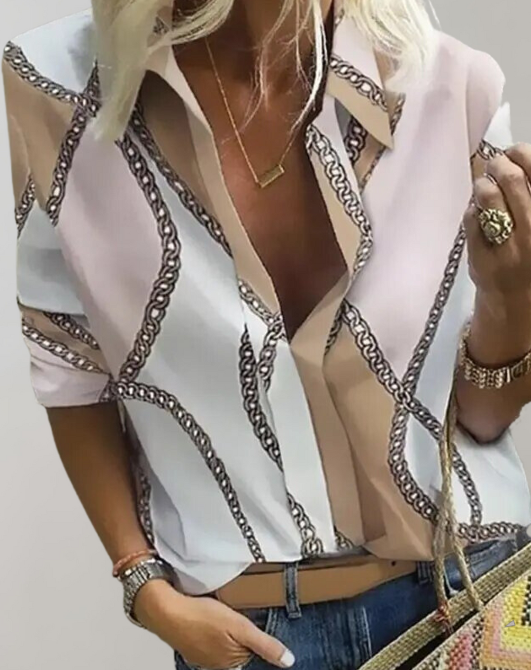 Stylish women's long sleeve blouse featuring a sophisticated chain print. Ideal for versatile fashion.