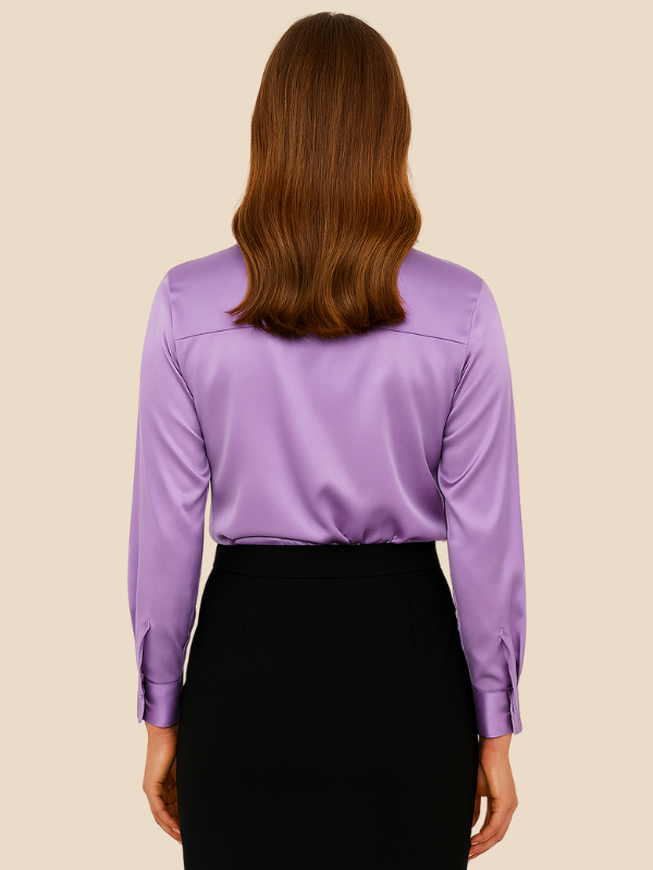 Elegant long sleeve button-down blouse for women, a cornerstone of professional fashion.
