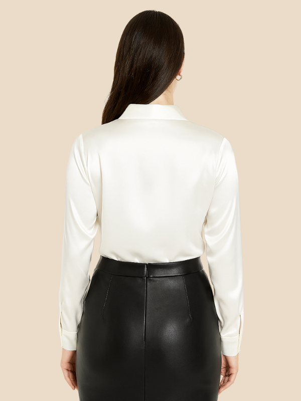 Classic long sleeve button blouse for women, offering an elegant and professional look.