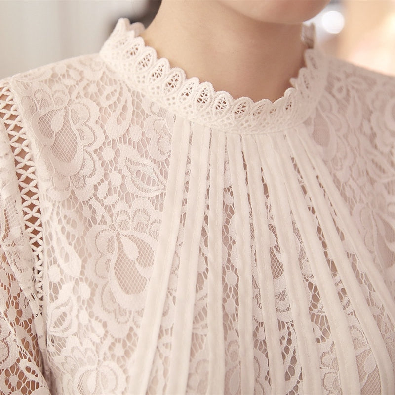 Versatile chic women's lace blouse with long sleeves, elegant floral lace, and a stylish stand collar for any occasion.