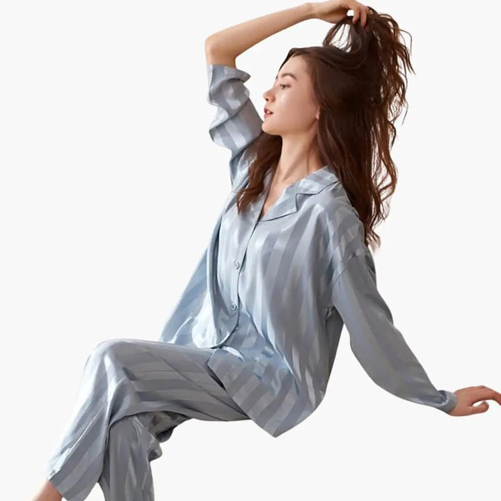 Cozy 2-piece women's long sleeve pajama set for elegant sleepwear & lounge. Relaxed fit, wide leg design.