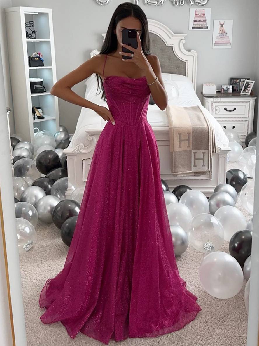 Flowing elegant women's maxi dress with long sleeves and an open neck, a flattering formal evening gown.