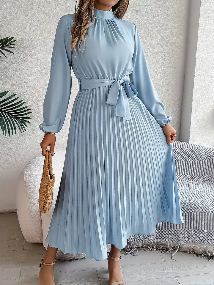 Elegant women's long sleeve pleated midi dress with a stylish belted waist. Perfect for fall/spring fashion.