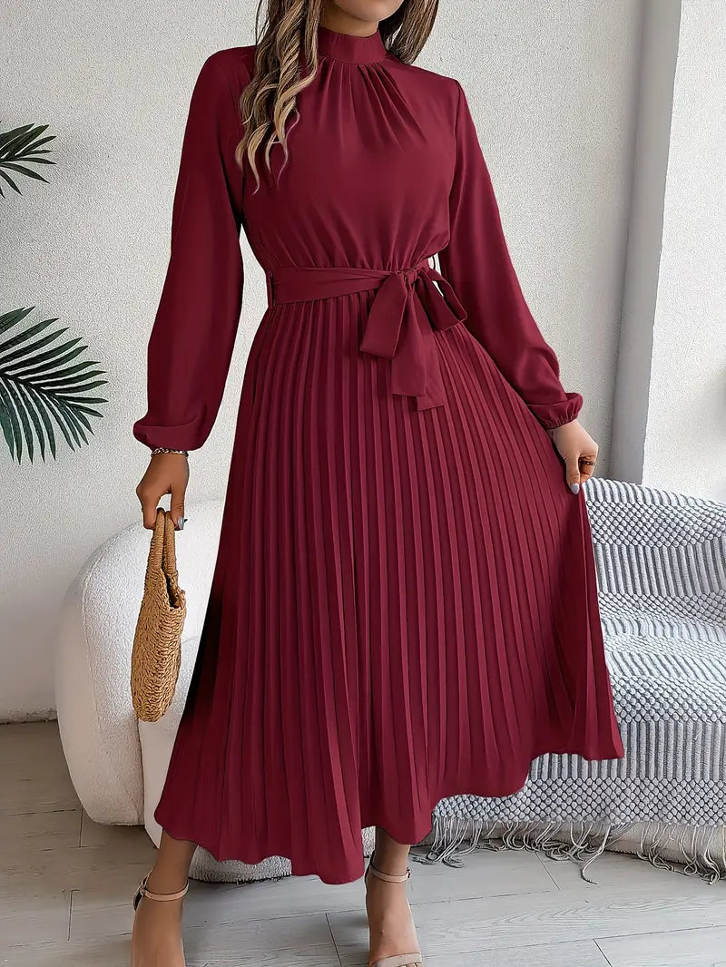 Chic women's elegant midi dress with long sleeves, a flattering pleated skirt & defined belted waist.