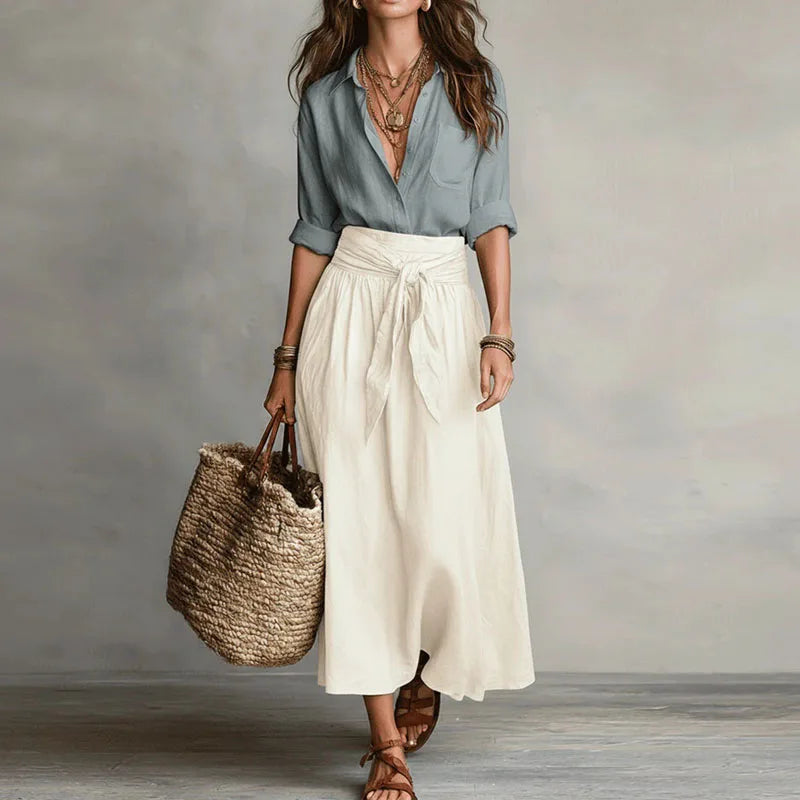 Elegant women's long sleeve skirt suit co-ord set. Button-down top & tie-waist skirt. Perfect for office style.
