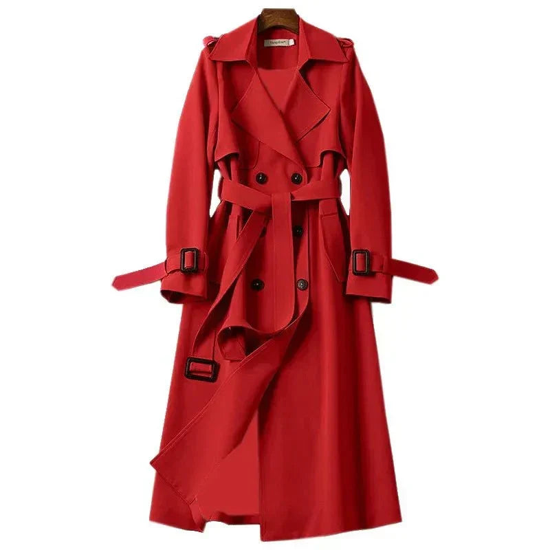 Women's office trenchcoat: a long, double-breasted design with a structured collar and adjustable tie belt.