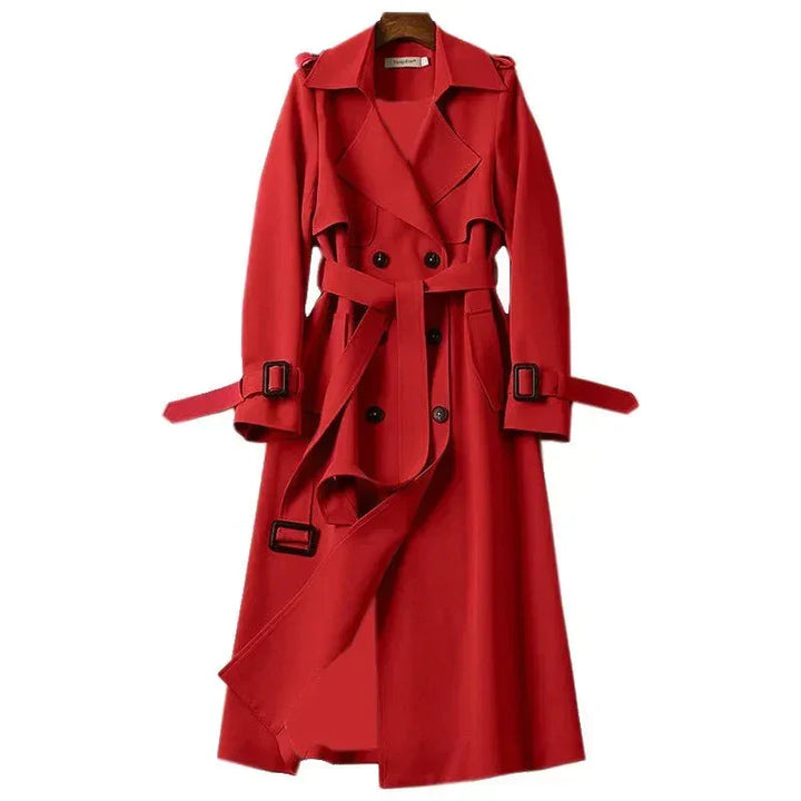 Women's office trenchcoat: a long, double-breasted design with a structured collar and adjustable tie belt.