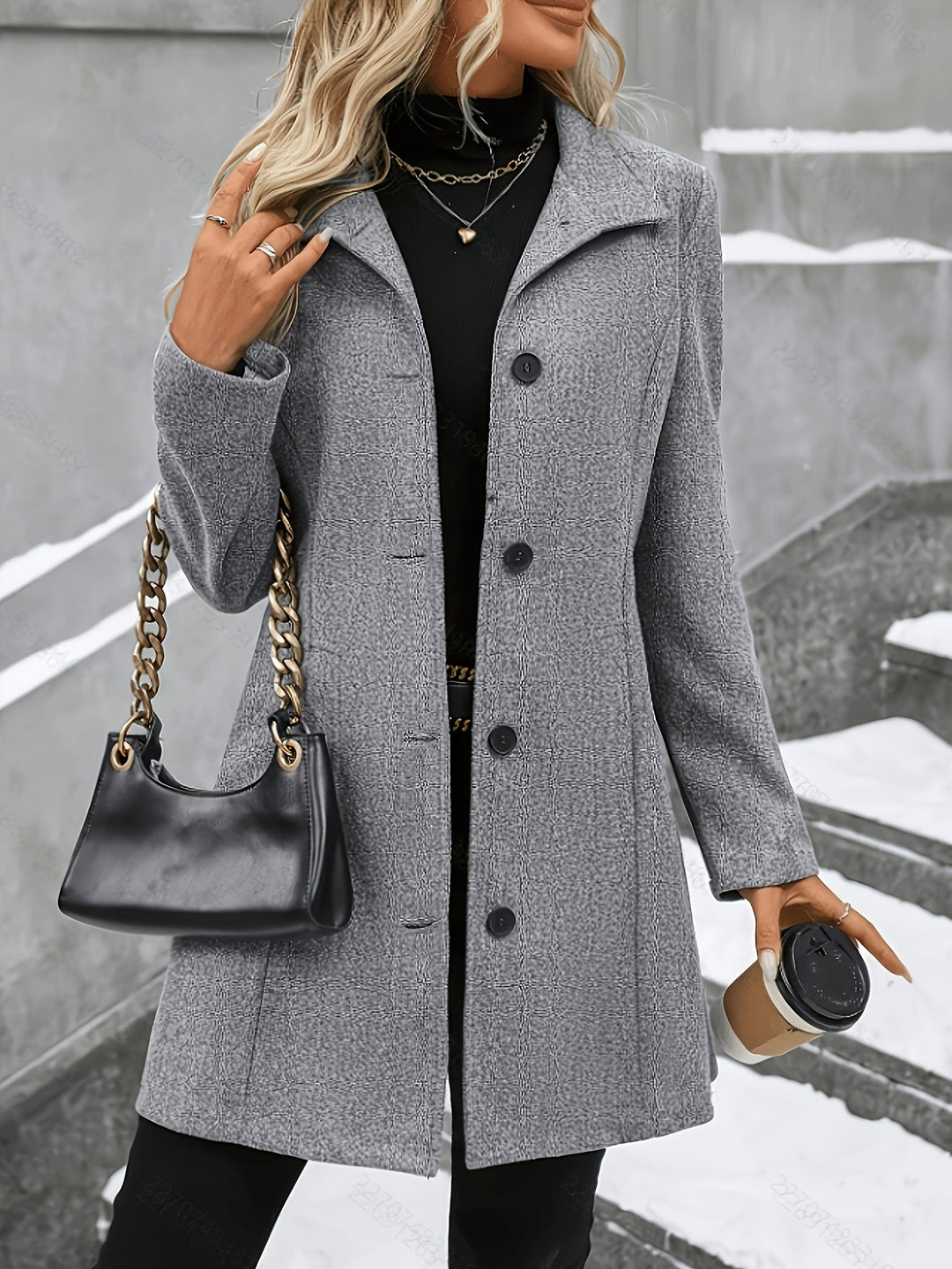 Elegant women's longline winter coat with tailored notch collar. Sophisticated outerwear for cold weather.