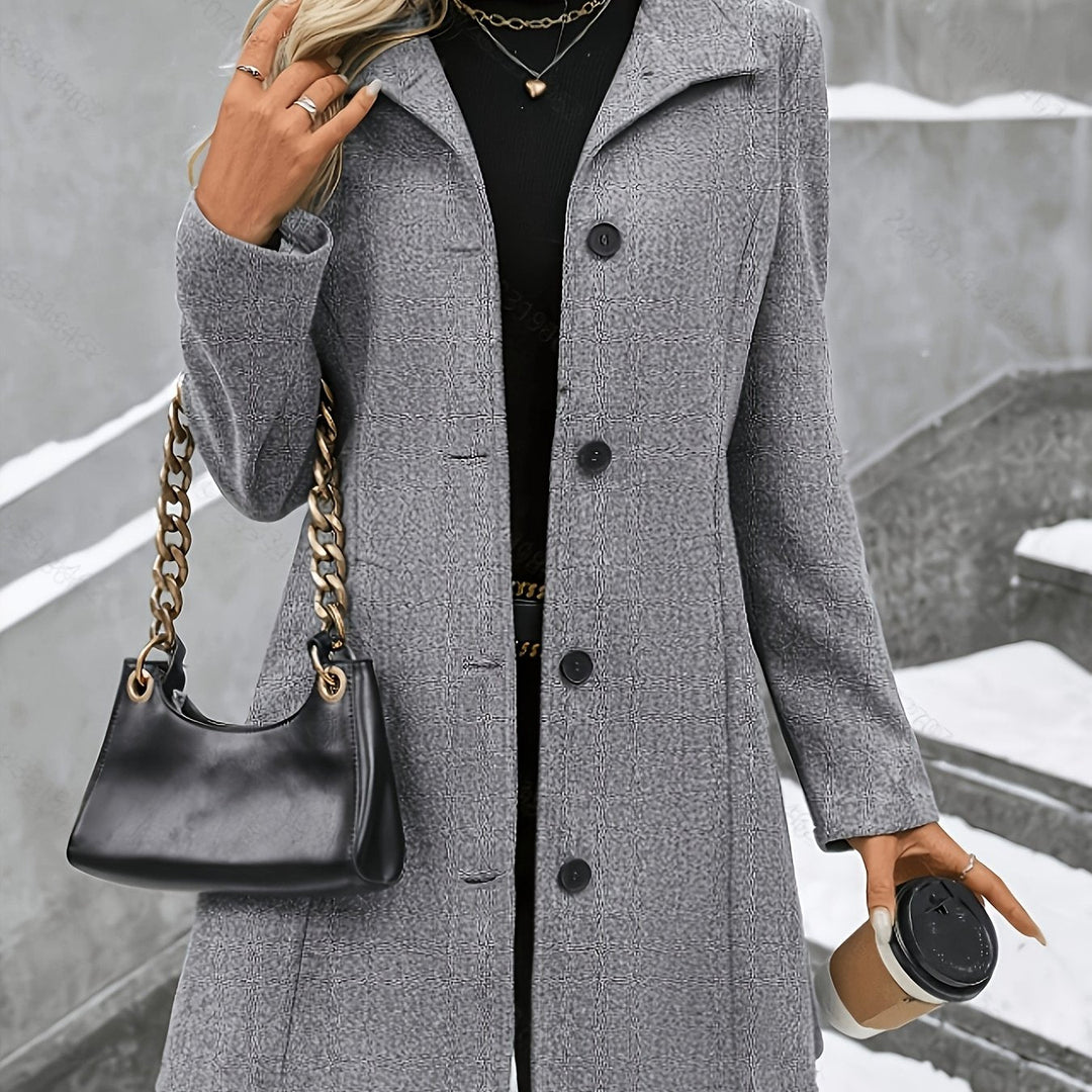 Elegant women's single-breasted longline coat with a tailored notch collar for stylish winter fashion.