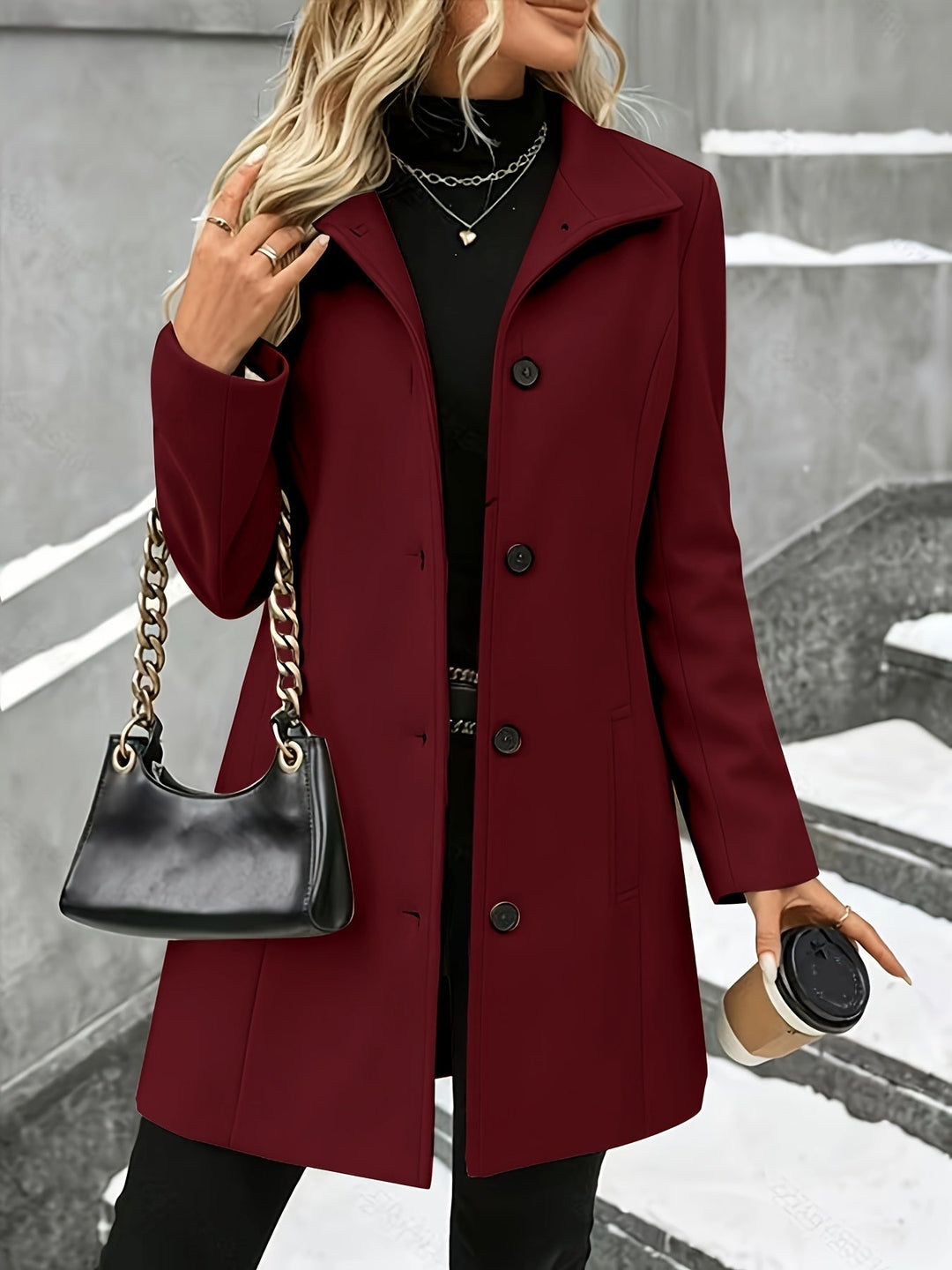 Cozy and elegant women's longline coat with tailored notch collar, perfect for winter fashion.