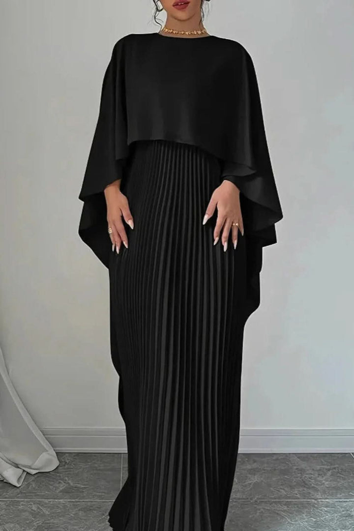 Gorgeous women's formal pleated maxi dress featuring a chic cape. An elegant long gown for galas & special occasions.