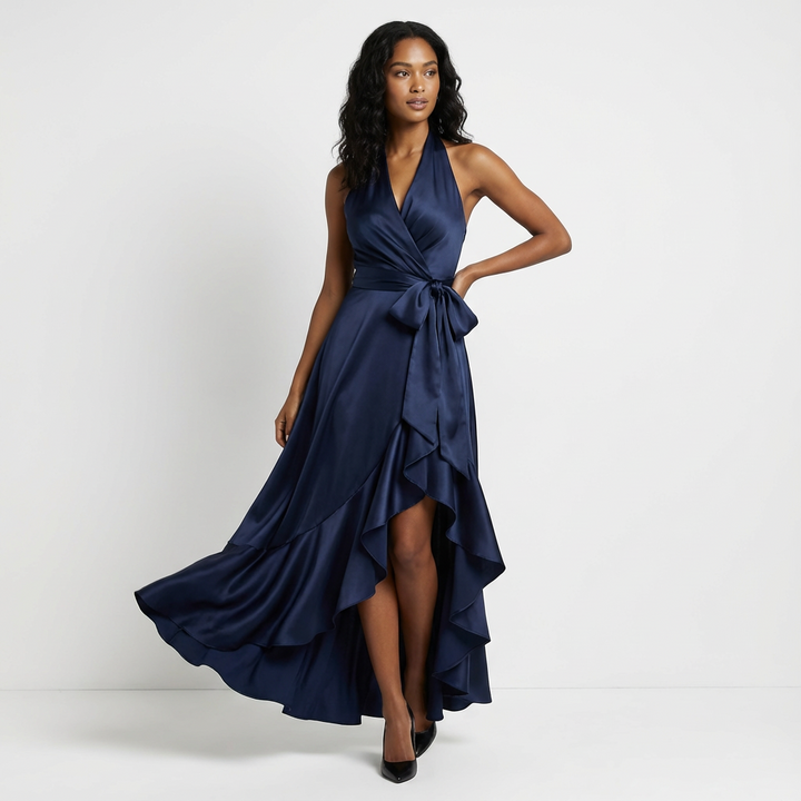Sleek silhouette of a women's elegant tie-waist maxi dress, ideal formal wear for wedding guests.