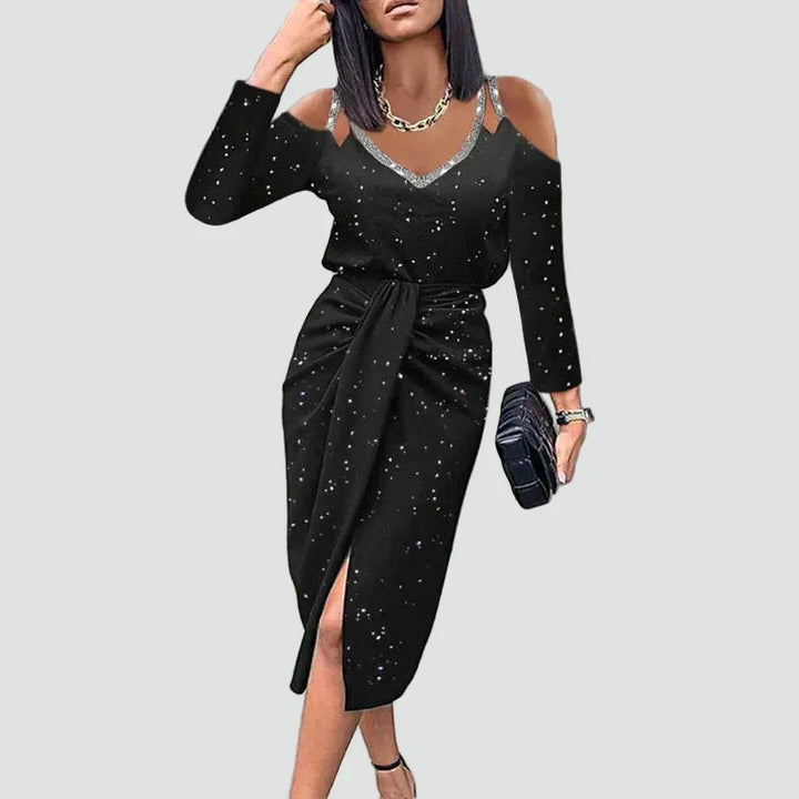 Formal women's midi cocktail dress showcasing beautiful lace sleeves, a V-neckline, and an elegant silhouette.