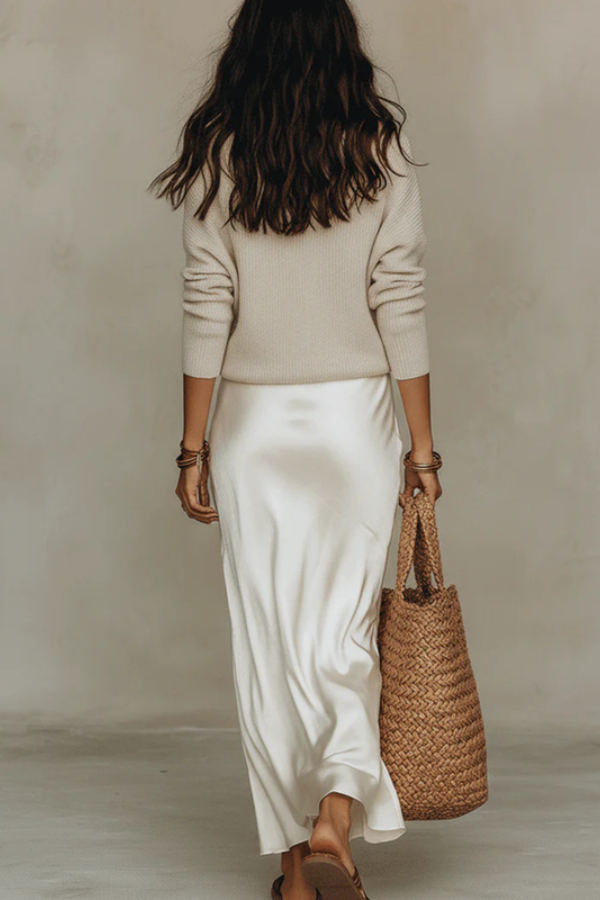 Versatile women's two-piece midi dress and sweater set, ideal for a chic, layered look.