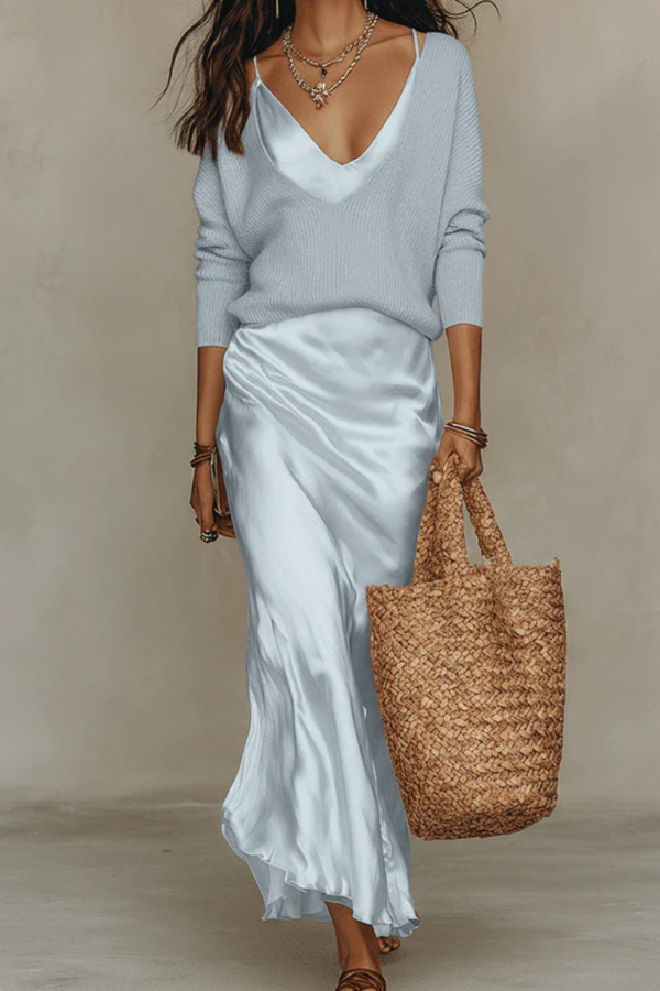 Women's day-to-evening elegant midi dress and sweater set, a stylish and versatile co-ord.