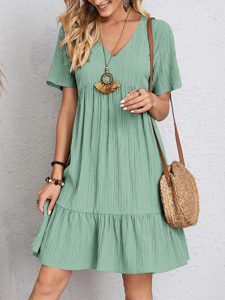 Versatile women's midi dress for casual or formal occasions, featuring elegant design & belly coverage.