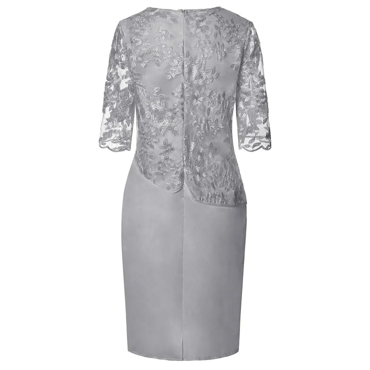 Pink short sleeve midi dress for women. Elegant, flattering design with a ruched waist, perfect for occasion wear.