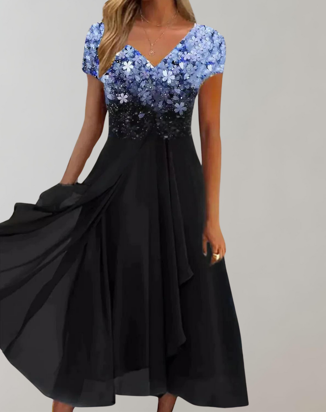 Elegant women's midi dress with intricate floral embellishments, perfect for special occasions & parties.