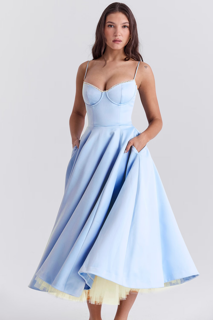 Stylish women's sleeveless midi dress featuring delicate lace trim, a structured corset bodice, and practical pockets.