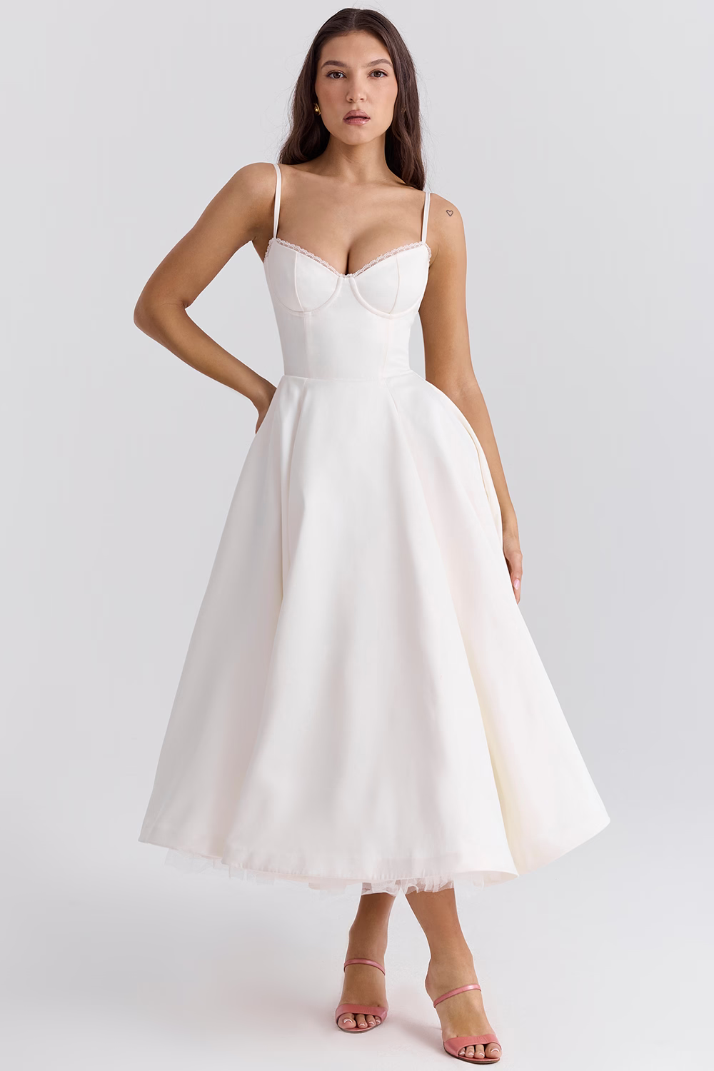 Sophisticated women's special occasion midi dress with elegant lace trim, a defined corset waist, and practical pockets.