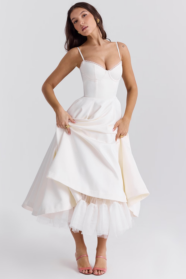Fashionable women's midi dress. Sweetheart neckline, intricate lace trim, corset bodice, and functional pockets for any event.