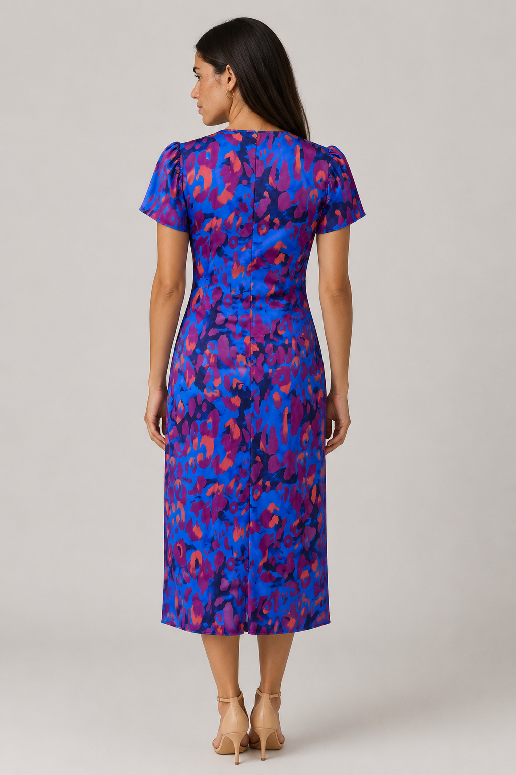 Women's stylish midi dress featuring puff sleeves & a cinched waist. Perfect V-neck abstract print summer dress.