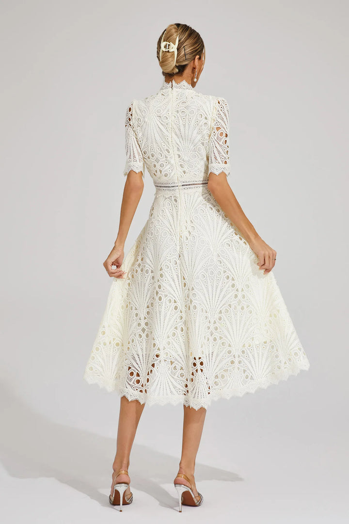 Elegant women's party midi dress, tailored for a flattering fit, perfect for events.